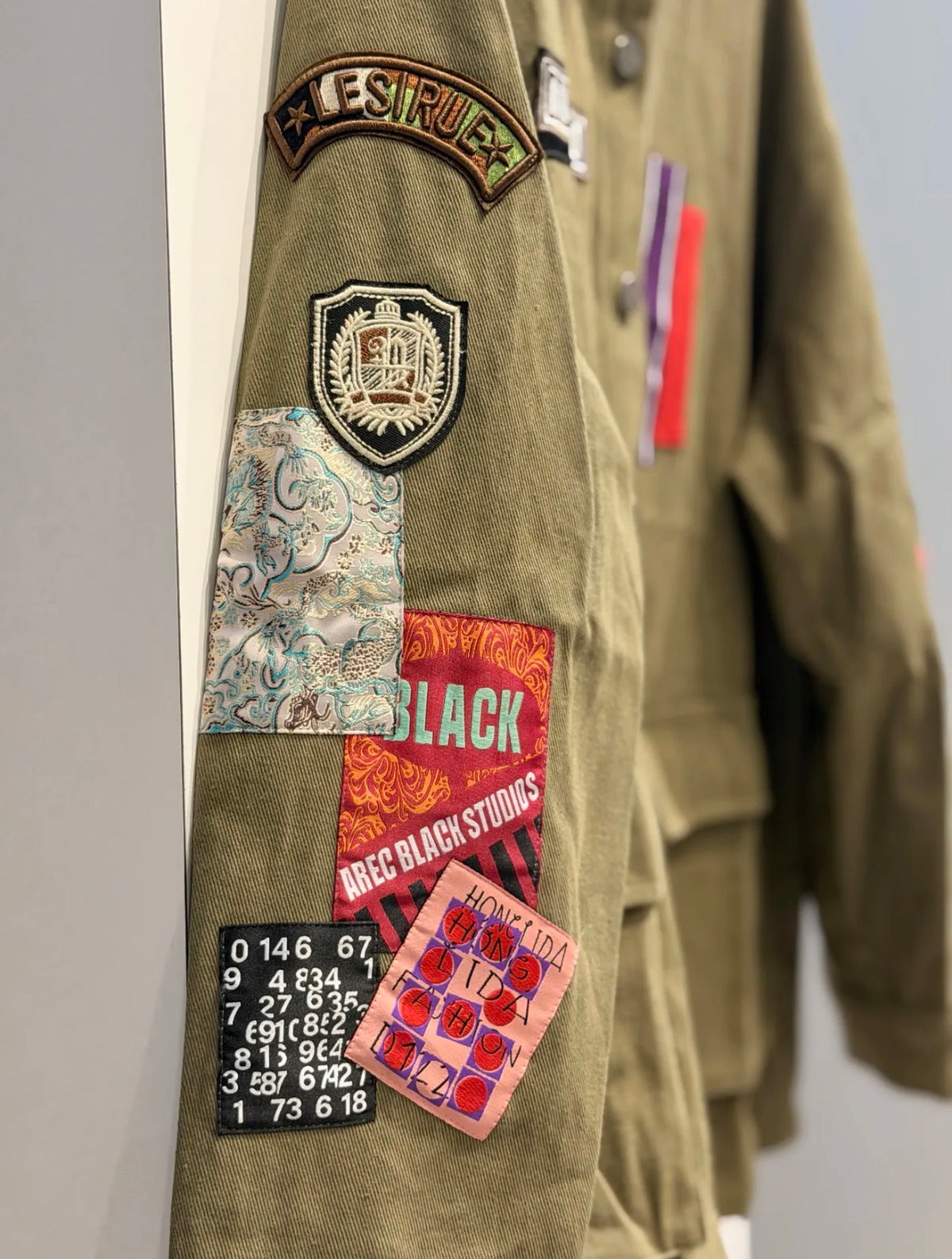 GIACCA PATCH 1º DROP